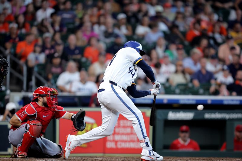 Sep 1, 2025; Houston, Texas, USA; Houston Astros left fielder Yordan Alvarez (44) hits a single against the Los Angeles Angels during the fifth inning at Daikin Park. Mandatory Credit: Erik Williams-Imagn Images