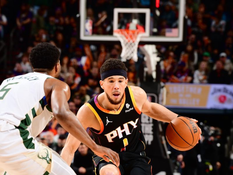 PHOENIX, AZ - FEBRUARY 6:  Devin Booker #1 of the Phoenix Suns handles the ball during the game  on February 6, 2024 at Footprint Center in Phoenix, Arizona. NOTE TO USER: User expressly acknowledges and agrees that, by downloading and or using this photograph, user is consenting to the terms and conditions of the Getty Images License Agreement. Mandatory Copyright Notice: Copyright 2024 NBAE (Photo by Barry Gossage/NBAE via Getty Images)