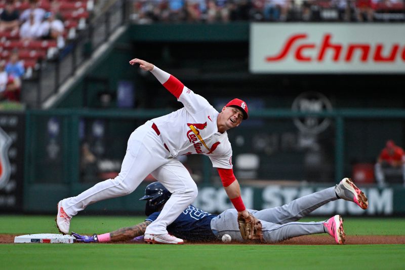 Aug 6, 2024; St. Louis, Missouri, USA;  St. Louis Cardinals second baseman Nolan Gorman (16) is unable to tag out Tampa Bay Rays center fielder Jose Siri (22) as he stills second base during the first inning at Busch Stadium. Mandatory Credit: Jeff Curry-USA TODAY Sports