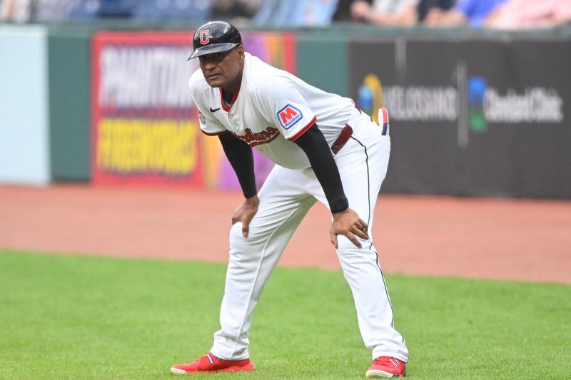 Jun 10, 2025; Cleveland, Ohio, USA; Cleveland Guardians first base coach Sandy Alomar Jr. (15) stands on the field in the second inning against the Cincinnati Reds at Progressive Field. Mandatory Credit: David Richard-Imagn Images