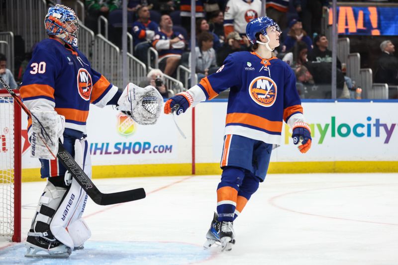 Mar 26, 2026; Elmont, New York, USA; New York Islanders goaltender Ilya Sorokin (30) congratulates defenseman Matthew Schaefer (48) after recording an assist in the third period against the Dallas Stars at UBS Arena. Mandatory Credit: Wendell Cruz-Imagn Images Mar 26, 2026; Elmont, New York, USA; New York Islanders goaltender Ilya Sorokin (30) congratulates defenseman Matthew Schaefer (48) after recording an assist in the third period against the Dallas Stars at UBS Arena. Mandatory Credit: Wendell Cruz-Imagn Images