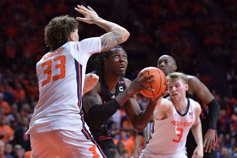 Jan 21, 2024; Champaign, Illinois, USA; Rutgers Scarlet Knights center Clifford Omoruyi (11) drives to the basket between Illinois Fighting Illini forward Coleman Hawkins (33) and Marcus Domask (3) during the second half at State Farm Center. Mandatory Credit: Ron Johnson-USA TODAY Sports