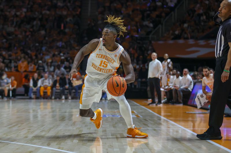 Feb 17, 2024; Knoxville, Tennessee, USA; Tennessee Volunteers guard Jahmai Mashack (15) moves the ball against the Vanderbilt Commodores during the first half at Thompson-Boling Arena at Food City Center. Mandatory Credit: Randy Sartin-USA TODAY Sports