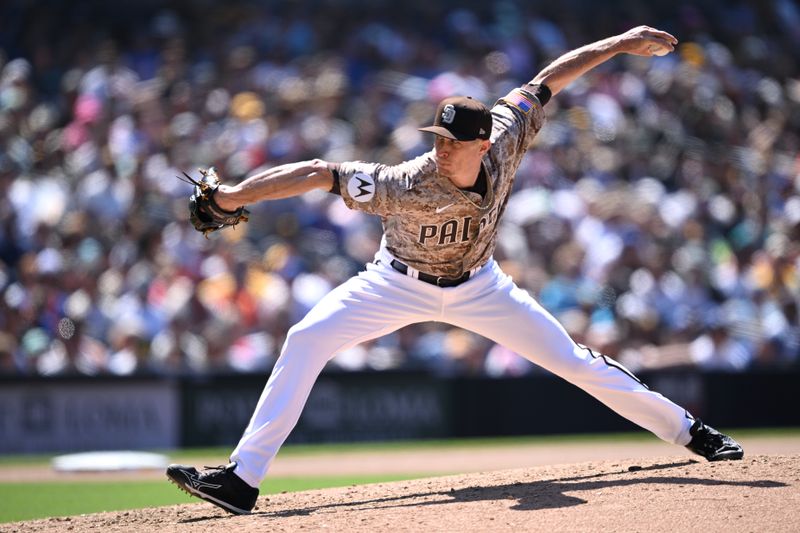 Jul 9, 2023; San Diego, California, USA; San Diego Padres relief pitcher Tim Hill (25) throws a pitch against the New York Mets during the seventh inning at Petco Park. Mandatory Credit: Orlando Ramirez-USA TODAY Sports