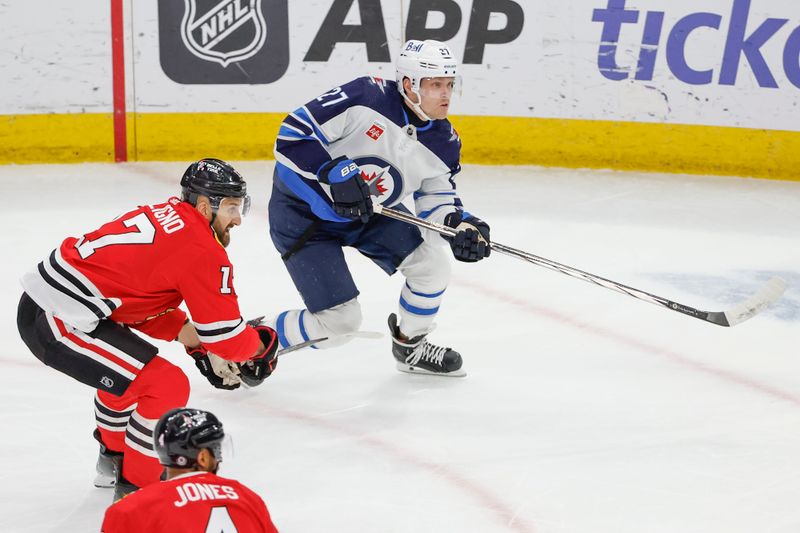 Feb 23, 2024; Chicago, Illinois, USA; Winnipeg Jets left wing Nikolaj Ehlers (27) reacts after scoring against the Chicago Blackhawks during the first period at United Center. Mandatory Credit: Kamil Krzaczynski-USA TODAY Sports