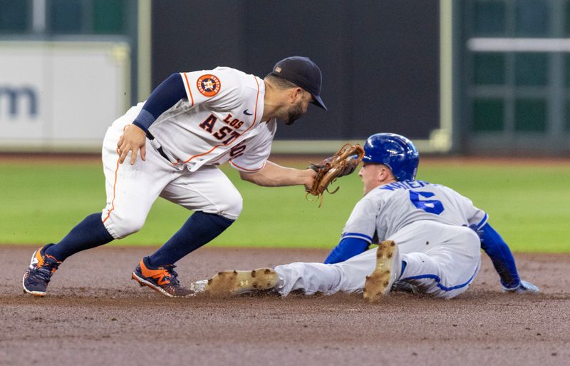 Sep 23, 2023; Houston, Texas, USA; Kansas City Royals right fielder Drew Waters (6) is tagged out by Houston Astros second baseman Jose Altuve (27) while trying to steal second base in the second inning at Minute Maid Park. Mandatory Credit: Thomas Shea-USA TODAY Sports