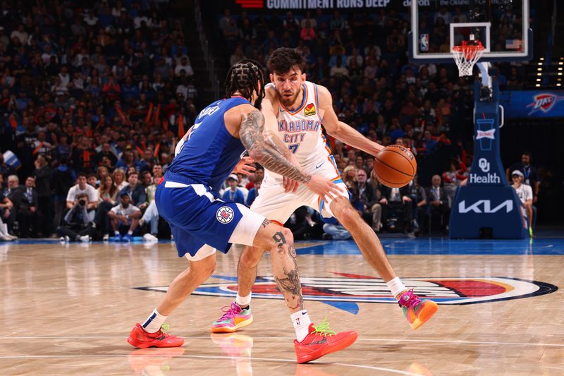 OKLAHOMA CITY, OK - FEBRUARY 22:  Chet Holmgren #7 of the Oklahoma City Thunder handles the ball during the game against the LA Clippers on February 22SF, 2024 at Paycom Arena in Oklahoma City, Oklahoma. NOTE TO USER: User expressly acknowledges and agrees that, by downloading and or using this photograph, User is consenting to the terms and conditions of the Getty Images License Agreement. Mandatory Copyright Notice: Copyright 2024 NBAE (Photo by Zach Beeker/NBAE via Getty Images)