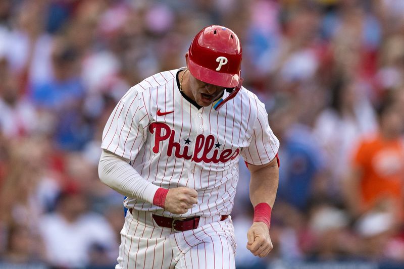 Jul 27, 2024; Philadelphia, Pennsylvania, USA;  Philadelphia Phillies outfielder Austin Hayes (9) reacts after hitting a single during the third inning against the Cleveland Guardians at Citizens Bank Park. Mandatory Credit: Bill Streicher-USA TODAY Sports