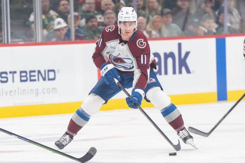 Mar 11, 2025; Saint Paul, Minnesota, USA; Colorado Avalanche center Brock Nelson (11) skates into the Minnesota Wild zone  in the first period at Xcel Energy Center. Mandatory Credit: Matt Blewett-Imagn Images