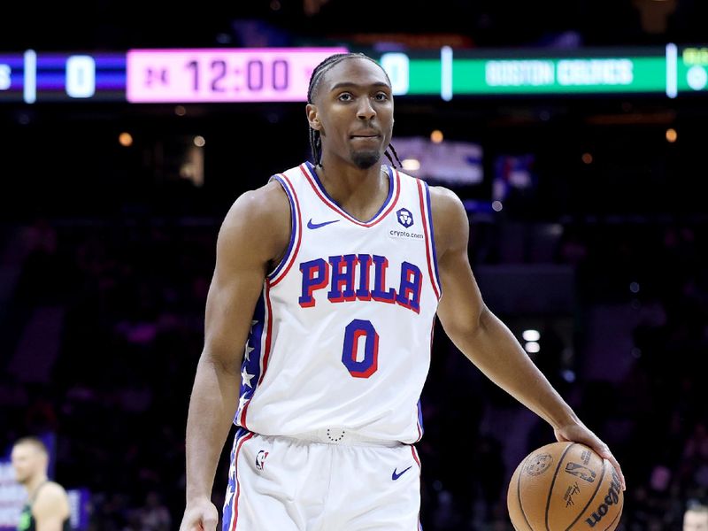 PHILADELPHIA, PENNSYLVANIA - FEBRUARY 02: Tyrese Maxey #0 of the Philadelphia 76ers dribbles the ball during a game against the Boston Celtics at the Wells Fargo Center on February 02, 2025 in Philadelphia, Pennsylvania. NOTE TO USER: User expressly acknowledges and agrees that, by downloading and or using this photograph, User is consenting to the terms and conditions of the Getty Images License Agreement. (Photo by Emilee Chinn/Getty Images)