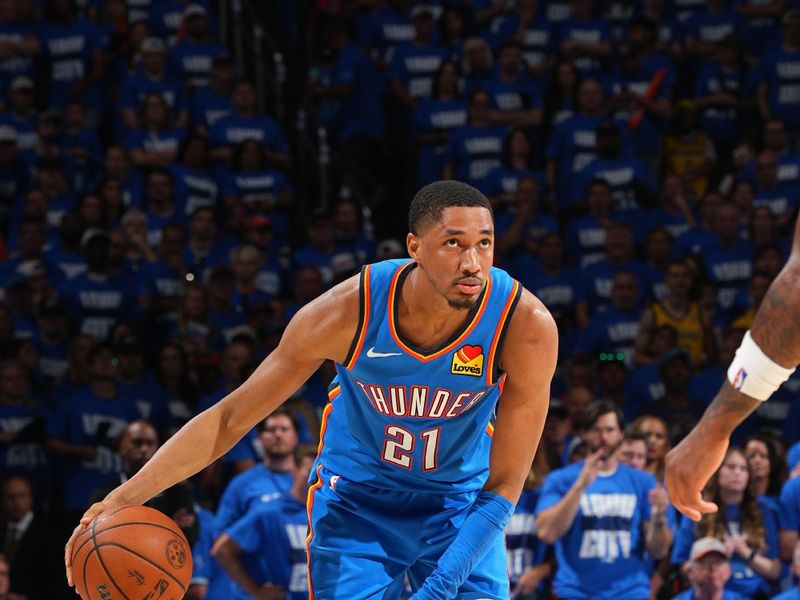 OKLAHOMA CITY, OK - JUNE 8:  Aaron Wiggins #21 of the Oklahoma City Thunder dribbles the ball during the game against the Indiana Pacers during Game Two of the 2025 NBA Finals on June 8, 2025 at Paycom Center in Oklahoma City, Oklahoma. NOTE TO USER: User expressly acknowledges and agrees that, by downloading and or using this photograph, User is consenting to the terms and conditions of the Getty Images License Agreement. Mandatory Copyright Notice: Copyright 2025 NBAE (Photo by Jesse D. Garrabrant/NBAE via Getty Images)
