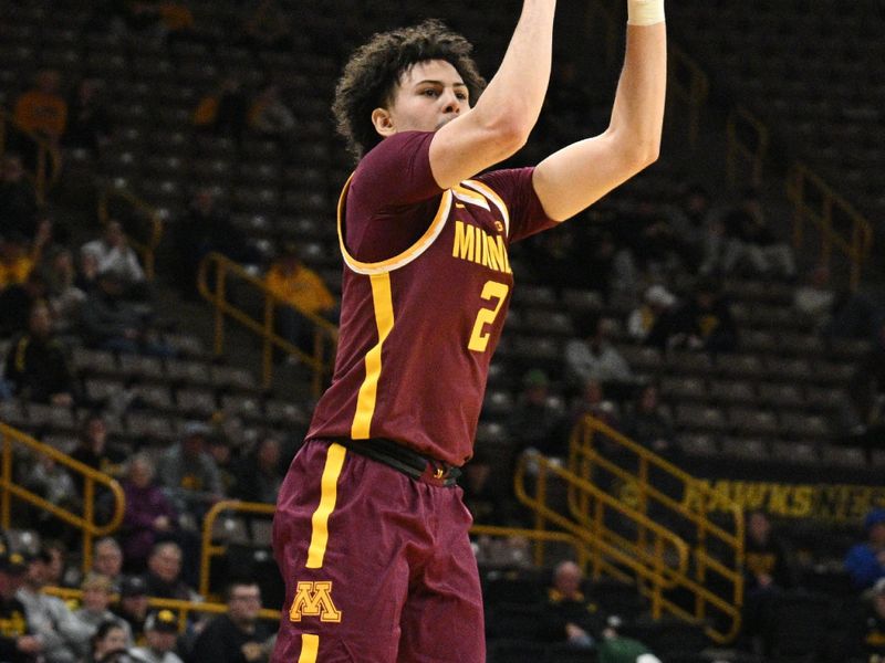 Feb 11, 2024; Iowa City, Iowa, USA; Minnesota Golden Gophers guard Mike Mitchell Jr. (2) shoots a three point basket against the Iowa Hawkeyes during the first half at Carver-Hawkeye Arena. Mandatory Credit: Jeffrey Becker-USA TODAY Sports