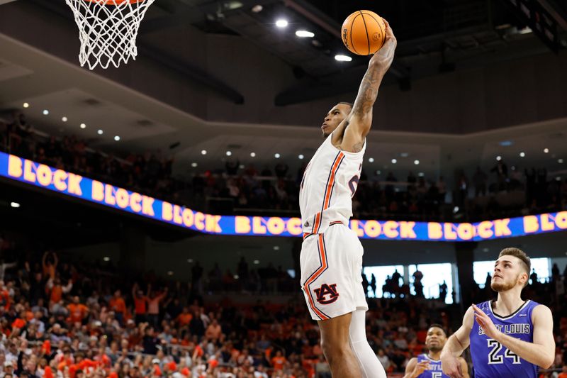 Nov 27, 2022; Auburn, Alabama, USA; Auburn Tigers guard Allen Flanigan (22) goes for a dunk during the second half against the Saint Louis Billikens at Neville Arena. Mandatory Credit: John Reed-USA TODAY Sports