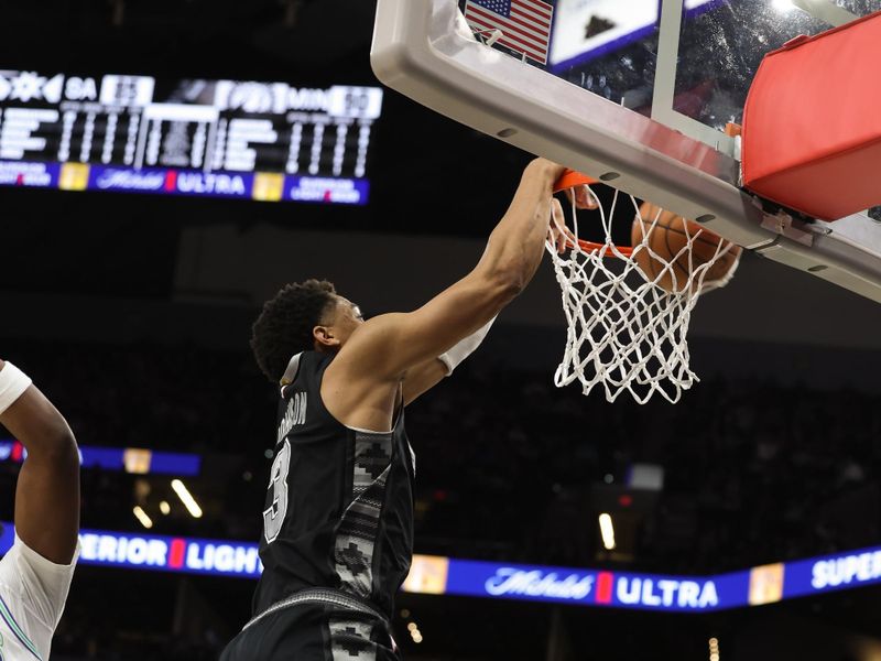 SAN ANTONIO, TX - JANUARY 27: Keldon Johnson #3 of the San Antonio Spurs dunks the ball during the game against the Minnesota Timberwolves on January 27, 2024 at the Frost Bank Center in San Antonio, Texas. NOTE TO USER: User expressly acknowledges and agrees that, by downloading and or using this photograph, user is consenting to the terms and conditions of the Getty Images License Agreement. Mandatory Copyright Notice: Copyright 2024 NBAE (Photos by David Sherman/NBAE via Getty Images)