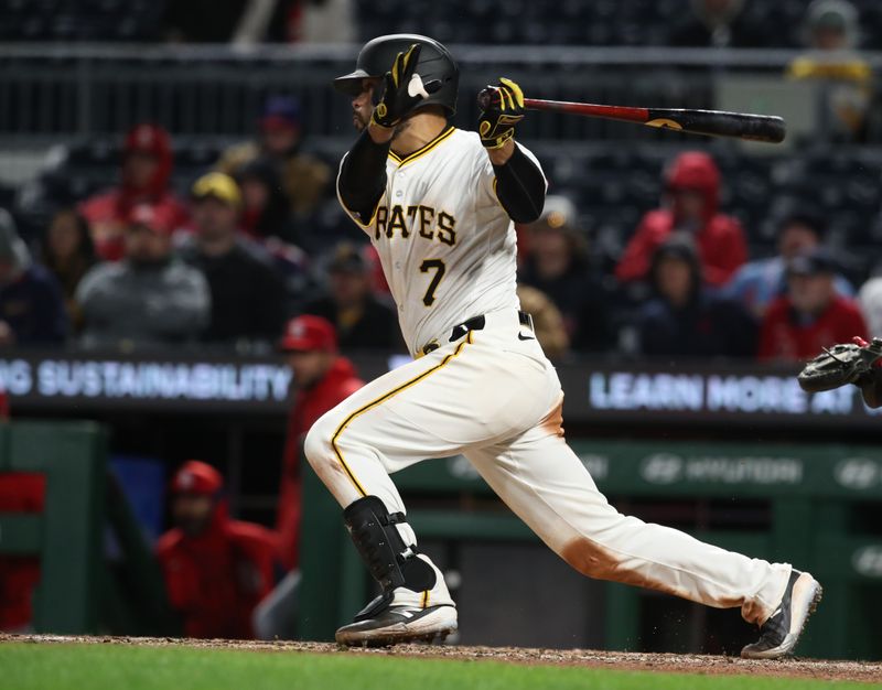 Apr 7, 2025; Pittsburgh, Pennsylvania, USA;  Pittsburgh Pirates shortstop Isiah Kiner-Falefa (7) hits a single against the St. Louis Cardinals during the seventh inning at PNC Park. Mandatory Credit: Charles LeClaire-Imagn Images