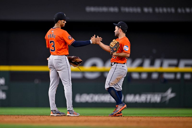 Aug 7, 2024; Arlington, Texas, USA;  Houston Astros shortstop Jeremy Pena (3) and second baseman Jose Altuve (27) celebrate after the Astros defeat the Texas Rangers at Globe Life Field. Mandatory Credit: Jerome Miron-USA TODAY Sports
