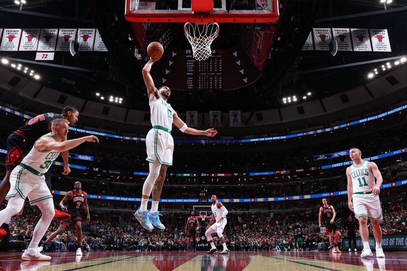 CHICAGO, IL - NOVEMBER 29: Jayson Tatum #0 of the Boston Celtics rebounds the ball during the game against the Chicago Bulls during the Emirates NBA Cup game on November 29, 2024 at United Center in Chicago, Illinois. NOTE TO USER: User expressly acknowledges and agrees that, by downloading and or using this photograph, User is consenting to the terms and conditions of the Getty Images License Agreement. Mandatory Copyright Notice: Copyright 2024 NBAE (Photo by Jeff Haynes/NBAE via Getty Images)