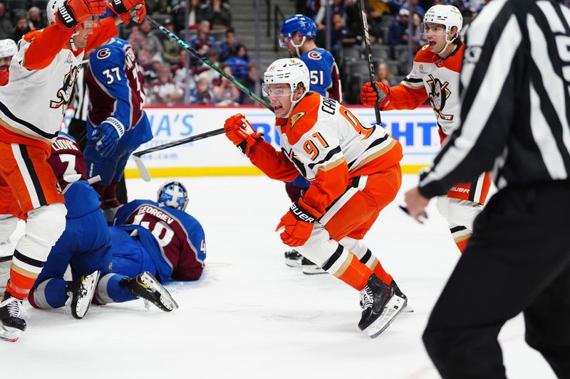 Oct 18, 2024; Denver, Colorado, USA; Anaheim Ducks center Leo Carlsson (91) celebrates his goal in the first period against the Colorado Avalanche at Ball Arena. Mandatory Credit: Ron Chenoy-Imagn Images