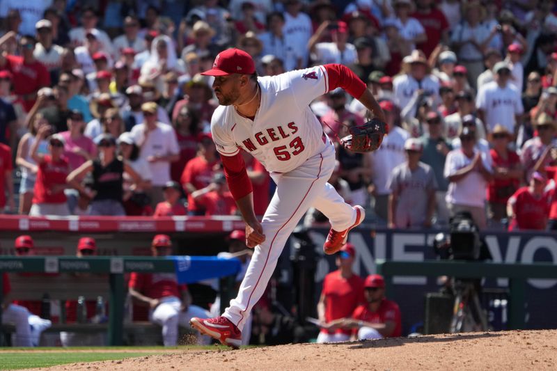 Jul 2, 2023; Anaheim, California, USA; Los Angeles Angels relief pitcher Carlos Estevez (53) throws in the ninth inning against the Arizona Diamondbacks at Angel Stadium. Mandatory Credit: Kirby Lee-USA TODAY Sports