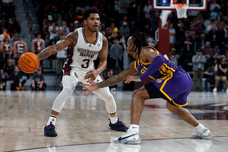 Feb 8, 2023; Starkville, Mississippi, USA; Mississippi State Bulldogs guard Shakeel Moore (3) dribbles as LSU Tigers guard Justice Hill (3) defends during the first half at Humphrey Coliseum. Mandatory Credit: Petre Thomas-USA TODAY Sports