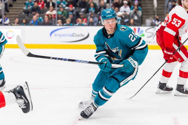 Nov 18, 2024; San Jose, California, USA; San Jose Sharks left wing Fabian Zetterlund (20) skates during the third period against the Detroit Red Wings at SAP Center at San Jose. Mandatory Credit: Bob Kupbens-Imagn Images