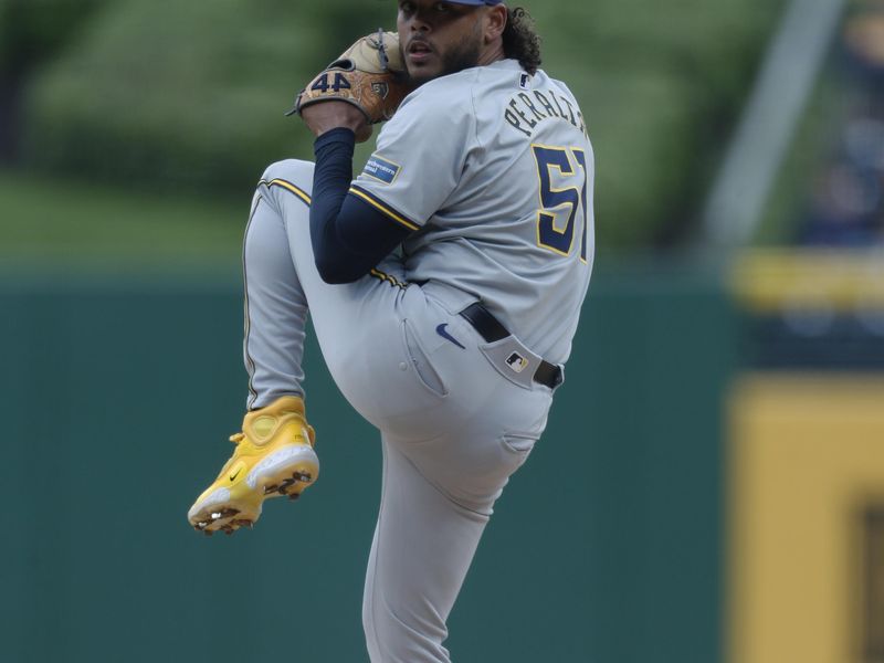 Apr 25, 2024; Pittsburgh, Pennsylvania, USA;  Milwaukee Brewers starting pitcher Freddy Peralta (51) delivers a pitch against the Pittsburgh Pirates during the first inning at PNC Park. Mandatory Credit: Charles LeClaire-USA TODAY Sports