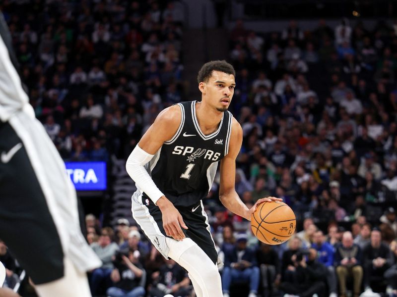 MINNEAPOLIS, MN -  FEBRUARY 27: Victor Wembanyama #1 of the San Antonio Spurs dribbles the ball during the game against the Minnesota Timberwolves on February 27, 2024 at Target Center in Minneapolis, Minnesota. NOTE TO USER: User expressly acknowledges and agrees that, by downloading and or using this Photograph, user is consenting to the terms and conditions of the Getty Images License Agreement. Mandatory Copyright Notice: Copyright 2024 NBAE (Photo by Jordan Johnson/NBAE via Getty Images)