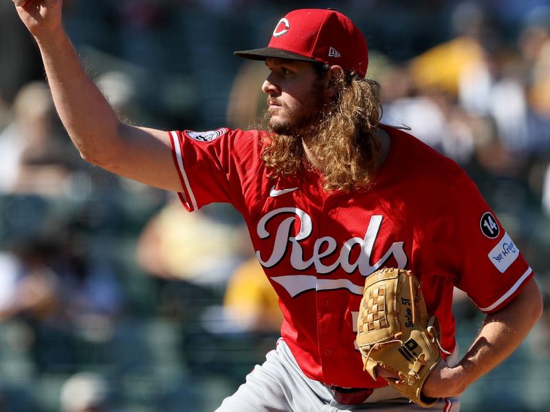 Sep 14, 2025; West Sacramento, California, USA; Cincinnati Reds pitcher Scott Barlow (58) throws a pitch against the Athletics during the eighth inning at Sutter Health Park. Mandatory Credit: Dennis Lee-Imagn Images