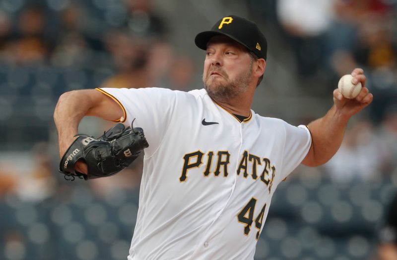 May 23, 2023; Pittsburgh, Pennsylvania, USA; Pittsburgh Pirates starting pitcher Rich Hill (44) delivers a pitch against the Texas Rangers during the first inning at PNC Park. Mandatory Credit: Charles LeClaire-USA TODAY Sports