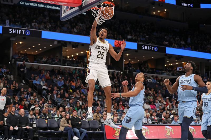 MEMPHIS, TENNESSEE - NOVEMBER 29: Trey Murphy III #25 of the New Orleans Pelicans goes to the basket against Desmond Bane #22 of the Memphis Grizzlies during the second half of an Emirates NBA Cup game at FedExForum on November 29, 2024 in Memphis, Tennessee. NOTE TO USER: User expressly acknowledges and agrees that, by downloading and or using this photograph, User is consenting to the terms and conditions of the Getty Images License Agreement. (Photo by Justin Ford/Getty Images)