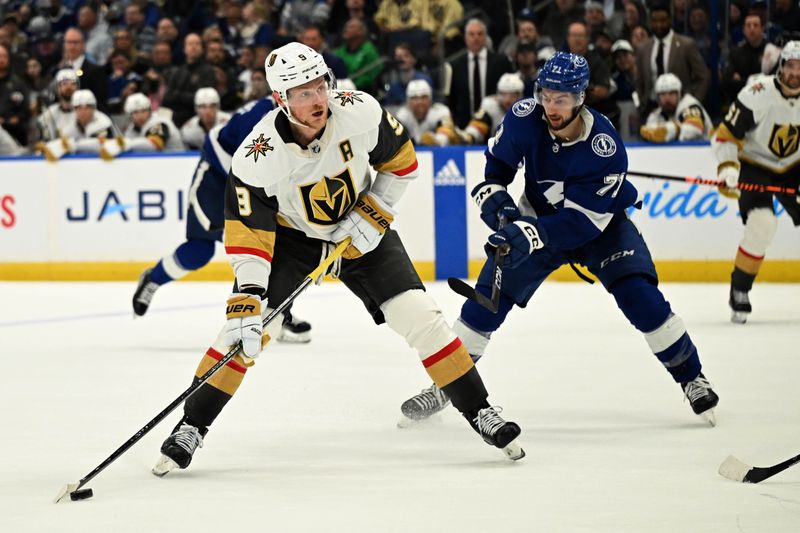 Dec 21, 2023; Tampa, Florida, USA; Las Vegas Golden Knights center Jack Eichel (9) takes a shot on goal in the second period against the Tampa Bay Lightning at Amalie Arena. Mandatory Credit: Jonathan Dyer-USA TODAY Sports