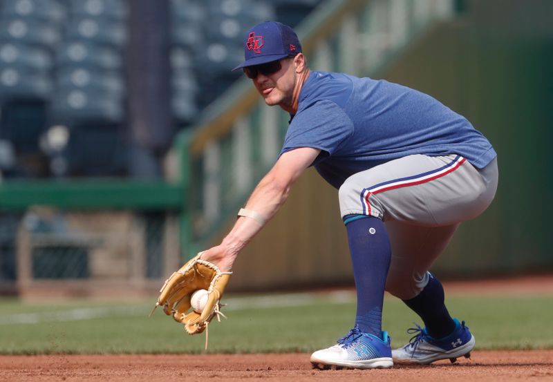 May 23, 2023; Pittsburgh, Pennsylvania, USA; Texas Rangers third baseman Josh Jung (6) takes ground balls  before the game against the Pittsburgh Pirates at PNC Park. Mandatory Credit: Charles LeClaire-USA TODAY Sports