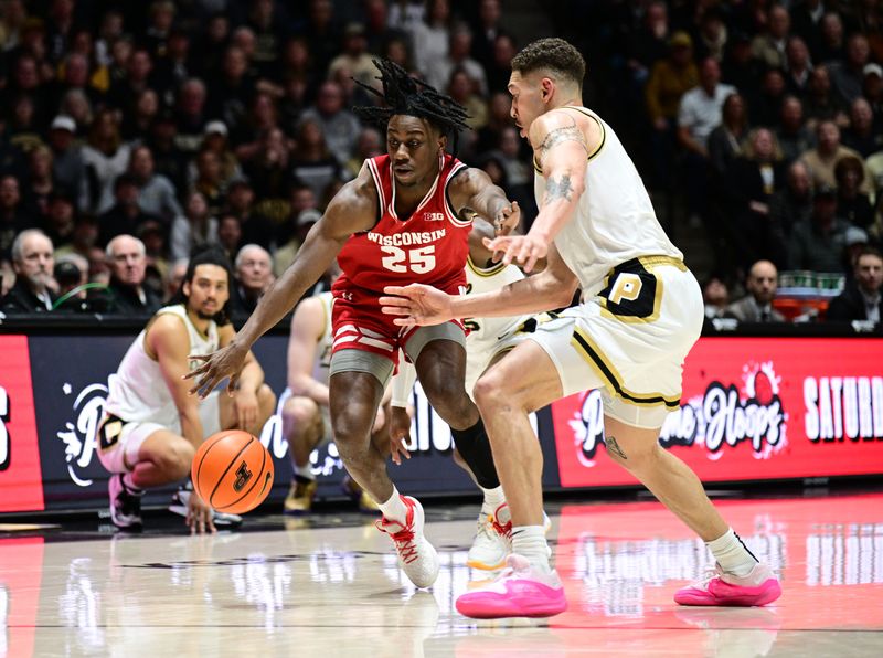 Mar 10, 2024; West Lafayette, Indiana, USA; Wisconsin Badgers guard John Blackwell (25) pushes toward the basket against Purdue Boilermakers forward Mason Gillis (0) during the first half at Mackey Arena. Mandatory Credit: Marc Lebryk-USA TODAY Sports