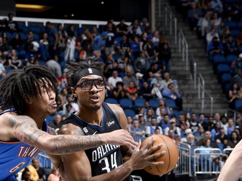 ORLANDO, FL - JANUARY 4: Wendell Carter Jr. #34 of the Orlando Magic drives to the basket against the Oklahoma City Thunder on January 4, 2023 at Amway Center in Orlando, Florida. NOTE TO USER: User expressly acknowledges and agrees that, by downloading and or using this photograph, User is consenting to the terms and conditions of the Getty Images License Agreement. Mandatory Copyright Notice: Copyright 2023 NBAE (Photo by Fernando Medina/NBAE via Getty Images)