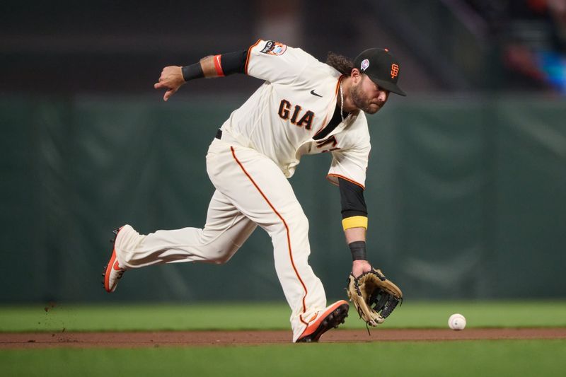 Sep 11, 2023; San Francisco, California, USA; San Francisco Giants infielder Brandon Crawford (35) fields a ground ball against the Cleveland Guardians during the fourth inning at Oracle Park. Mandatory Credit: Robert Edwards-USA TODAY Sports