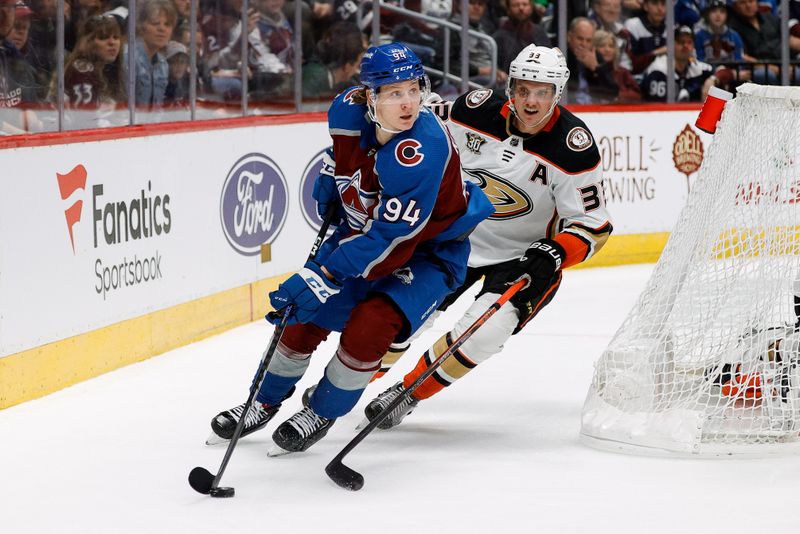 Dec 5, 2023; Denver, Colorado, USA; Colorado Avalanche center Joel Kiviranta (94) controls the puck ahead of Anaheim Ducks right wing Jakob Silfverberg (33) in the second period at Ball Arena. Mandatory Credit: Isaiah J. Downing-USA TODAY Sports