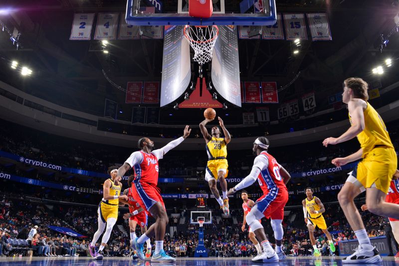 PHILADELPHIA, PA - DECEMBER 13: Quenton Jackson #29 of the Indiana Pacers drives to the basket during the game against the Philadelphia 76ers on December 13, 2024 at the Wells Fargo Center in Philadelphia, Pennsylvania NOTE TO USER: User expressly acknowledges and agrees that, by downloading and/or using this Photograph, user is consenting to the terms and conditions of the Getty Images License Agreement. Mandatory Copyright Notice: Copyright 2024 NBAE (Photo by Jesse D. Garrabrant/NBAE via Getty Images)