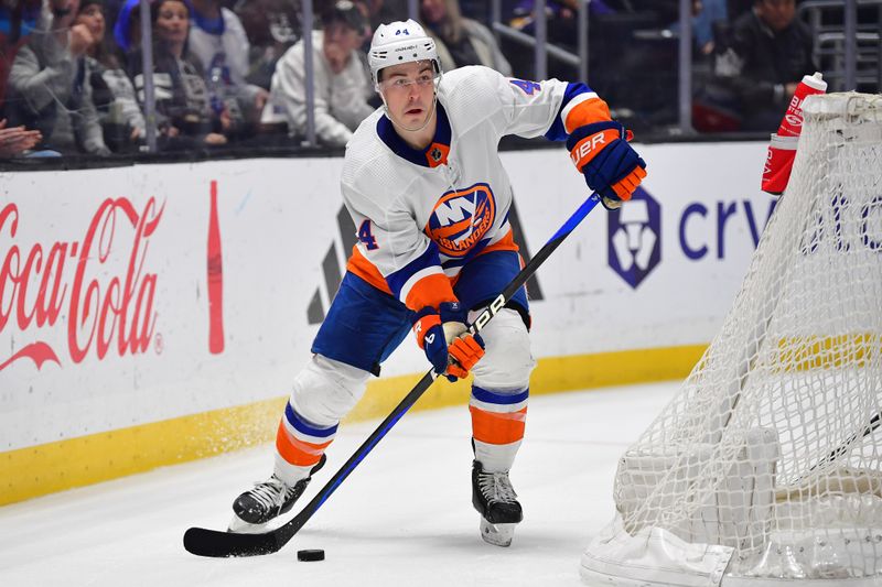 Mar 11, 2024; Los Angeles, California, USA; New York Islanders center Jean-Gabriel Pageau (44) controls the puck against the Los Angeles Kings during the third period at Crypto.com Arena. Mandatory Credit: Gary A. Vasquez-USA TODAY Sports