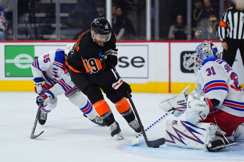 Nov 29, 2024; Philadelphia, Pennsylvania, USA; Philadelphia Flyers right wing Garnet Hathaway (19) shoots the puck against New York Rangers goalie Igor Shesterkin (31) in the first period at Wells Fargo Center. Mandatory Credit: Kyle Ross-Imagn Images