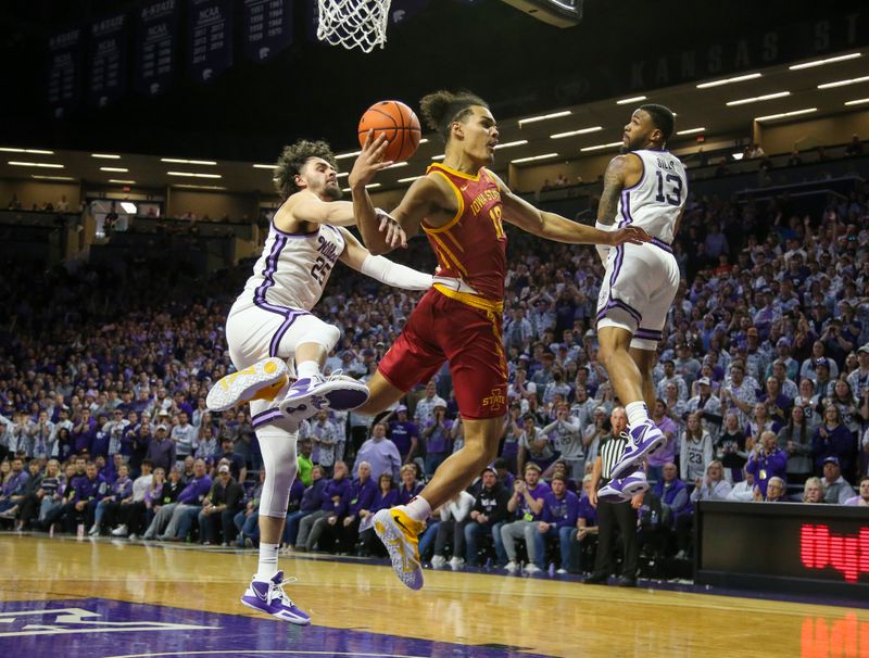 Feb 18, 2023; Manhattan, Kansas, USA; Iowa State Cyclones forward Robert Jones (12) is fouled by Kansas State Wildcats forward Ismael Massoud (25) during the second half at Bramlage Coliseum. Mandatory Credit: Scott Sewell-USA TODAY Sports