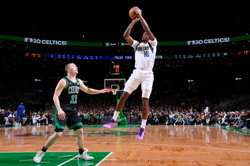 BOSTON, MA - MARCH 1: Olivier Maxence-Prosper #18 of the Dallas Mavericks shoots the ball during the game against the Boston Celtics on March 1, 2024 at the TD Garden in Boston, Massachusetts. NOTE TO USER: User expressly acknowledges and agrees that, by downloading and or using this photograph, User is consenting to the terms and conditions of the Getty Images License Agreement. Mandatory Copyright Notice: Copyright 2024 NBAE  (Photo by Brian Babineau/NBAE via Getty Images)