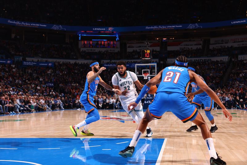 OKLAHOMA CITY, OK - JANUARY 29: Karl-Anthony Towns #32 of the Minnesota Timberwolves handles the ball during the game against the Oklahoma City Thunder on January 29, 2024 at Paycom Arena in Oklahoma City, Oklahoma. NOTE TO USER: User expressly acknowledges and agrees that, by downloading and or using this photograph, User is consenting to the terms and conditions of the Getty Images License Agreement. Mandatory Copyright Notice: Copyright 2024 NBAE (Photo by Zach Beeker/NBAE via Getty Images)