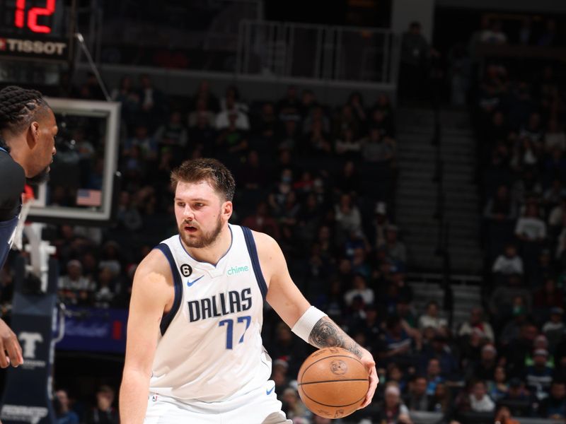 MINNEAPOLIS, MN -  DECEMBER 21: Luka Doncic #77 of the Dallas Mavericks drives to the basket during the game against the Minnesota Timberwolves on December 21, 2022 at Target Center in Minneapolis, Minnesota. NOTE TO USER: User expressly acknowledges and agrees that, by downloading and or using this Photograph, user is consenting to the terms and conditions of the Getty Images License Agreement. Mandatory Copyright Notice: Copyright 2022 NBAE (Photo by David Sherman/NBAE via Getty Images)