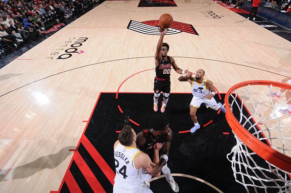 PORTLAND, OR - DECEMBER 14:  Scoot Henderson #00 of the Portland Trail Blazers goes to the basket during the game on December 14, 2023 at the Moda Center Arena in Portland, Oregon. NOTE TO USER: User expressly acknowledges and agrees that, by downloading and or using this photograph, user is consenting to the terms and conditions of the Getty Images License Agreement. Mandatory Copyright Notice: Copyright 2023 NBAE (Photo by Cameron Browne/NBAE via Getty Images)