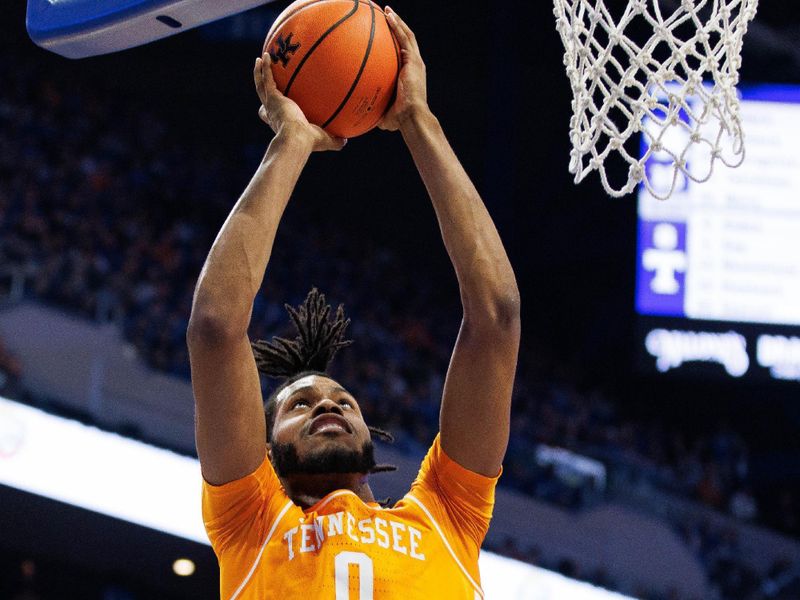 Feb 18, 2023; Lexington, Kentucky, USA; Tennessee Volunteers forward Jonas Aidoo (0) goes to the basket during the first half against the Kentucky Wildcats at Rupp Arena at Central Bank Center. Mandatory Credit: Jordan Prather-USA TODAY Sports