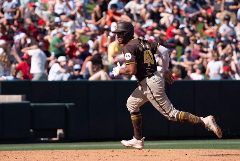 Mar 10, 2024; Tempe, Arizona, USA; San Diego Padres outfielder Oscar Mercado (40) scores in the sixth during a spring training game against the Los Angeles Angels at Tempe Diablo Stadium. Mandatory Credit: Allan Henry-USA TODAY Sports