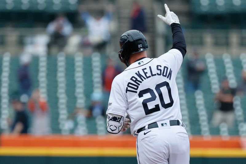 Sep 28, 2023; Detroit, Michigan, USA; Detroit Tigers designated hitter Spencer Torkelson (20) celebrates after he hit a three run home run in the seventh inning against the Kansas City Royals at Comerica Park. Mandatory Credit: Rick Osentoski-USA TODAY Sports