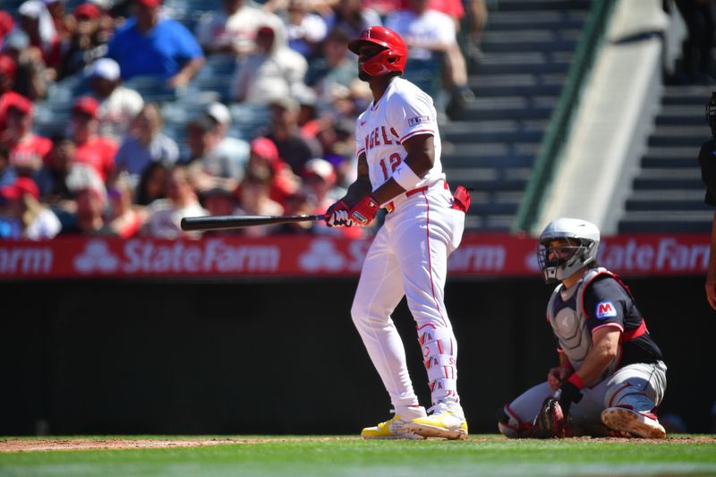 Apr 6, 2025; Anaheim, California, USA; Los Angeles Angels right fielder Jorge Soler (12) hits a solo home run against the Cleveland Guardians during the sixth inning at Angel Stadium. Mandatory Credit: Gary A. Vasquez-Imagn Images