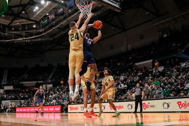 Jan 6, 2024; Charlotte, North Carolina, USA; Charlotte 49ers forward Igor Milicic Jr. (24) blocks a shot by Florida Atlantic Owls guard Alijah Martin (15) during the second half at Dale F. Halton Arena. Mandatory Credit: Jim Dedmon-USA TODAY Sports