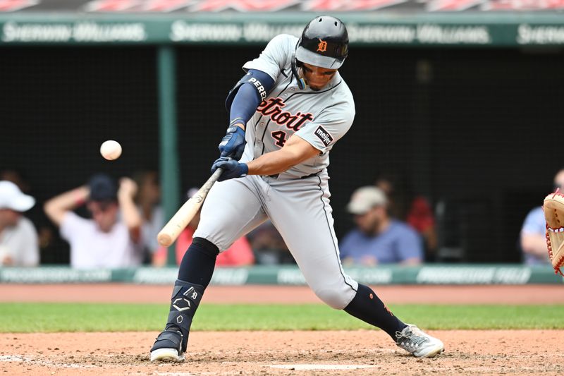 Jul 25, 2024; Cleveland, Ohio, USA; Detroit Tigers right fielder Wenceel Perez (46) hits a single during the seventh inning against the Cleveland Guardians at Progressive Field. Mandatory Credit: Ken Blaze-USA TODAY Sports